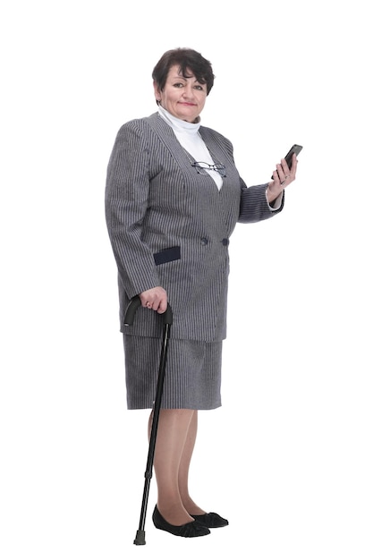 In full growth confident old woman with a walking stick