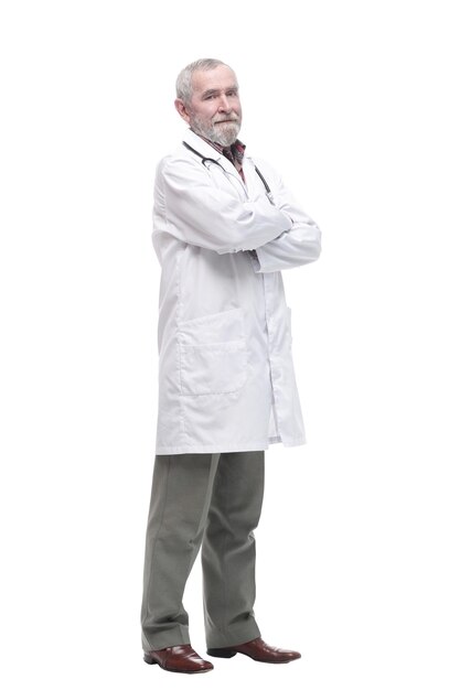 in full growth. elderly competent doctor with a stethoscope. isolated on a white background.