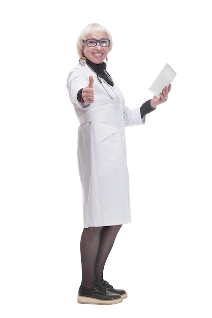 In full growth. female doctor with a digital tablet. isolated on a white background.