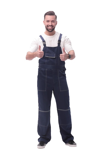 In full growth friendly man in overalls showing thumbs up