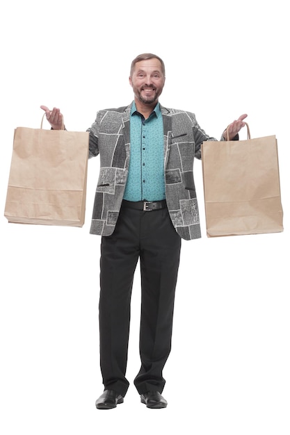 In full growth. happy man with shopping bags.