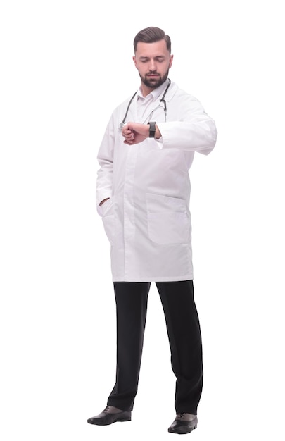 In full growth medical doctor looking at his wrist watch