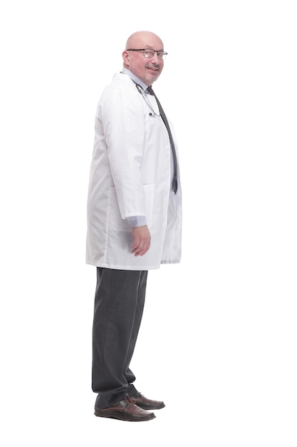 In full growth. successful mature doctor in a white coat .isolated on a white background