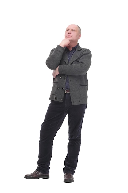 In full growth. thoughtful mature man .isolated on a white background.