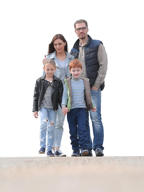 In full growthcouple with two children standing together photo with copy space