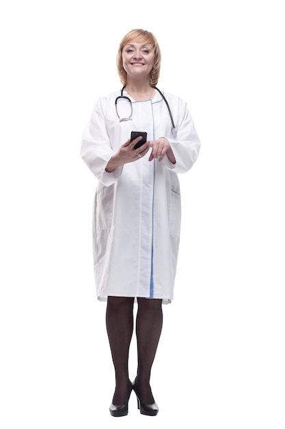 In full growthmature female doctor with smartphone