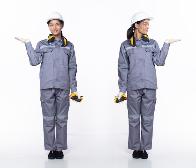 Full length 20s young Asian Woman contractor engineer showing empty palm hand