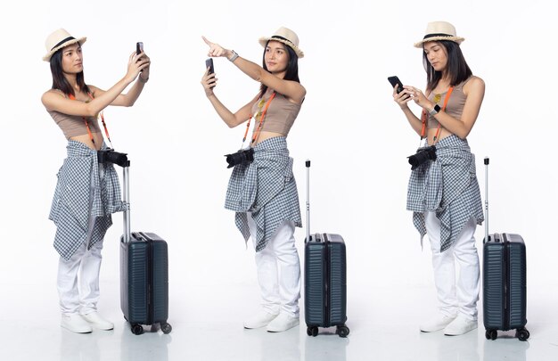 Full length 20s young Asian Woman guide tour traveller taking photo sightseeing