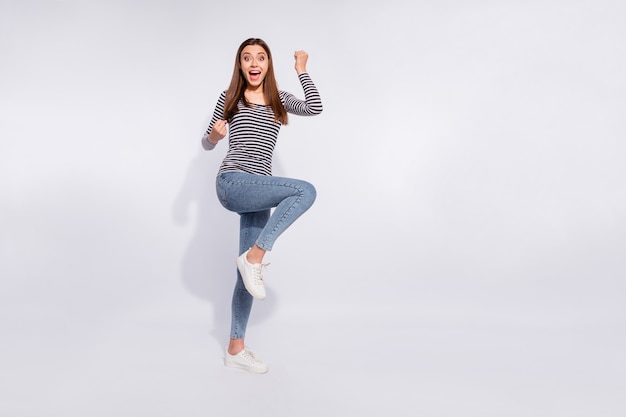 full length body size view of her she nice attractive charming cheerful cheery ecstatic straight-haired girl having fun lottery winning holiday vacation good news isolated over white light wall