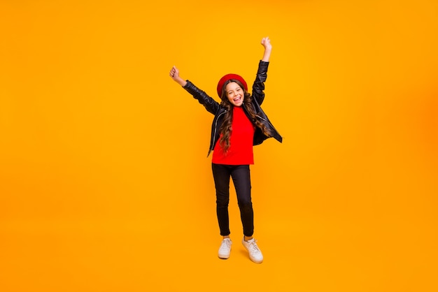 Full length body size view of her she nice attractive cheerful cheery glad long-haired girl wearing streetstyle having fun time isolated over bright vivid shine vibrant yellow color wall