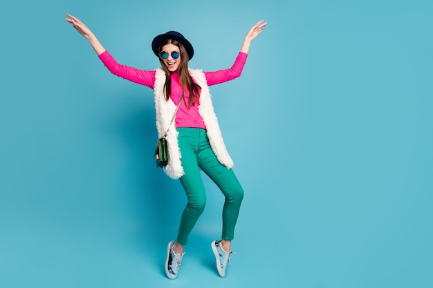 Full length body size view of her she nice-looking attractive funky positive cheerful cheery girl hipster dancing having fun isolated on bright vivid shine vibrant blue turquoise color wall