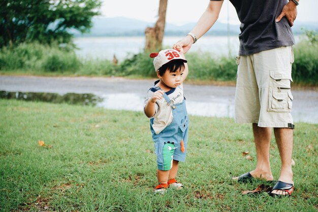 Full length of boy running on field