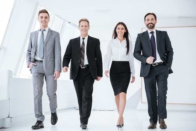 Full length Confident Business people walk in office