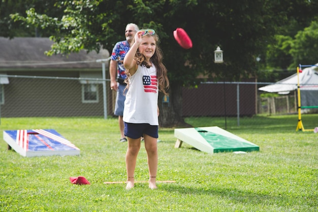 Full length of girl standing on field