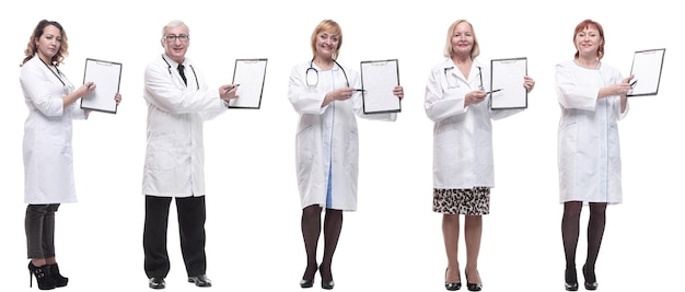 Full length group of doctors with notepad isolated