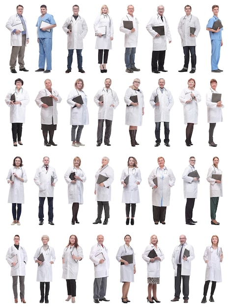 Full length group of doctors with notepad isolated