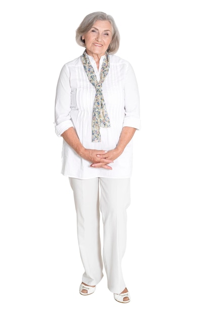 Full length happy senior woman posing isolated