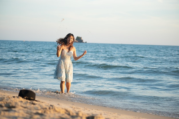 full length of man on beach against sky