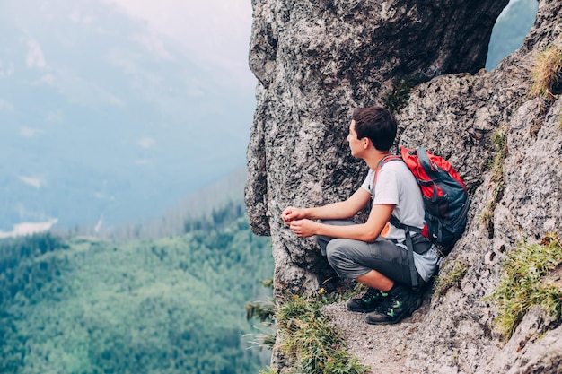 full length of a man on mountain against sky