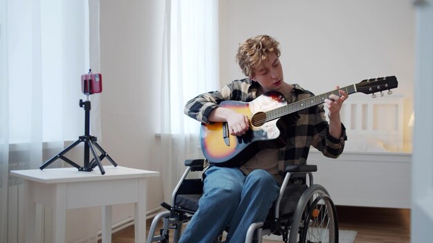 Full length of man playing guitar