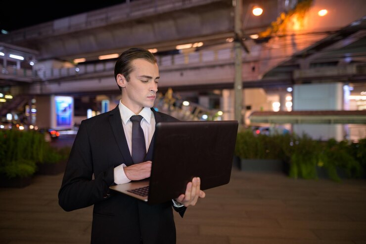 Full length of a man standing in illuminated building