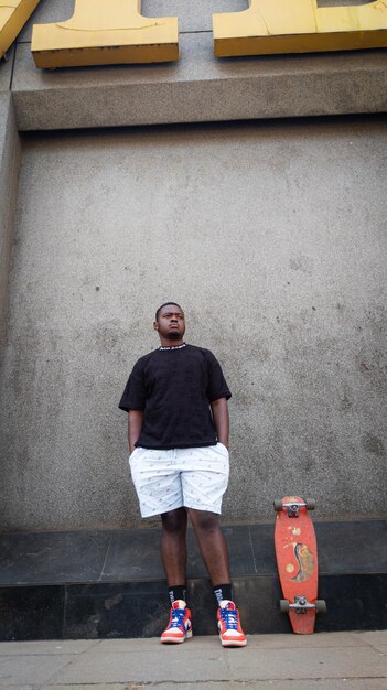 Photo full length of man standing on street