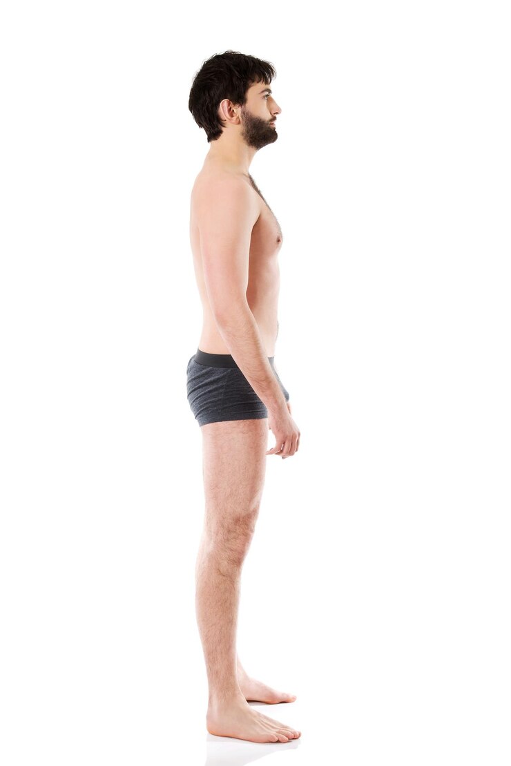 Photo ⁇  배경 에 서 있는 속옷 을 입은 남자 의 전체 길이