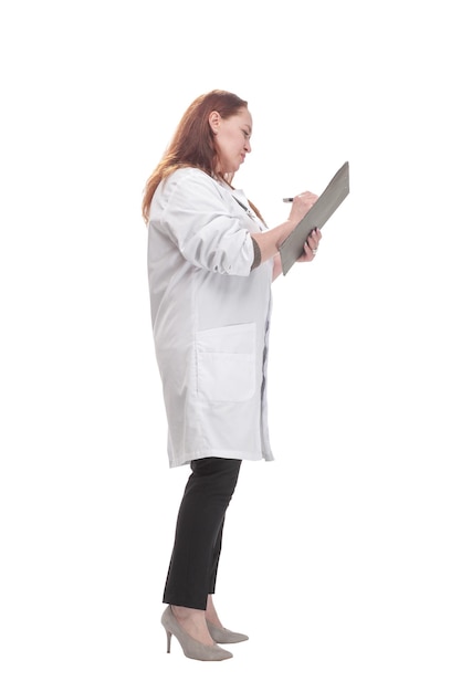 Full-length. mature female doctor with clipboard. isolated on a white background.