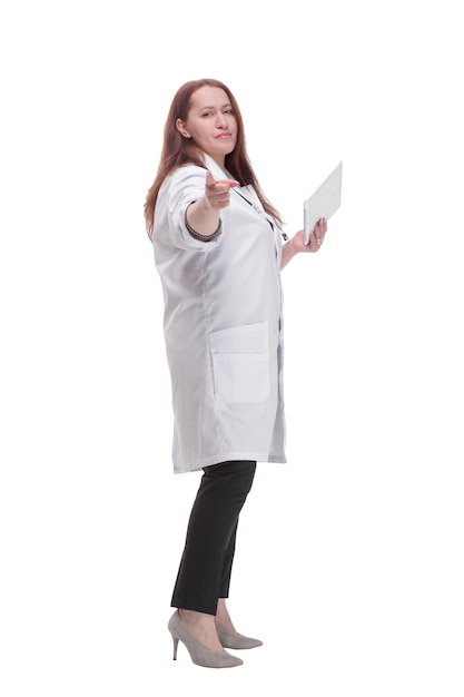 Full-length. mature female doctor with a digital tablet. isolated on a white background.