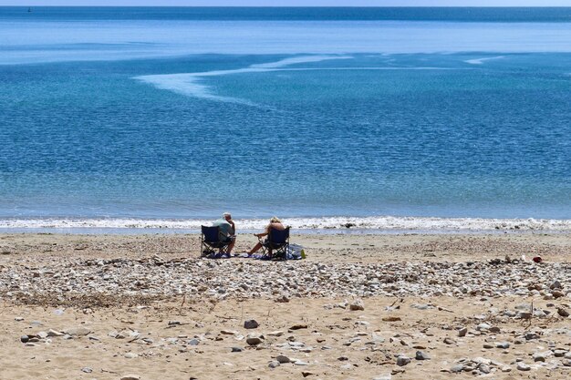 写真 浜辺の人々の全長