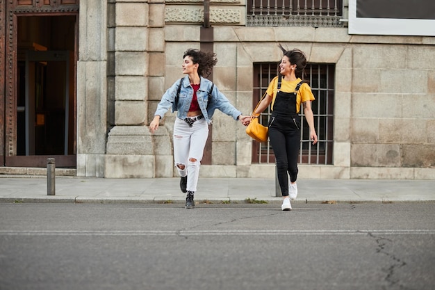 Photo full length of people on street in city