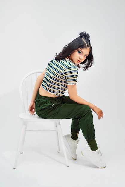 Full length photo of charming awesome winsome lady having pause and break sitting on chair isolated bright background