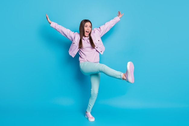 Full length photo of crazy pretty lady jump up supporting\
sports team cheerleader captain