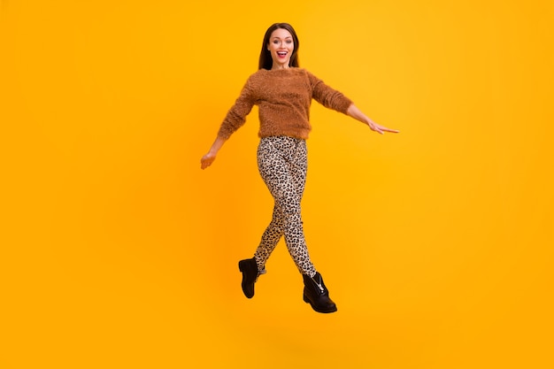 Full length photo of pretty funky lady jumping up high