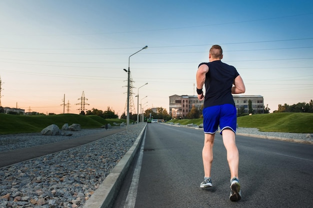 Full length portrait of athletic man running