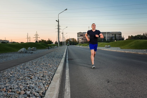 Full length portrait of athletic man running