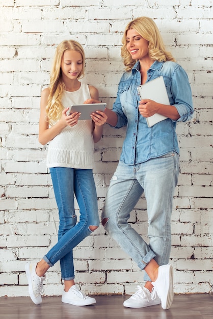 Full length portrait of attractive blonde teenage girl.