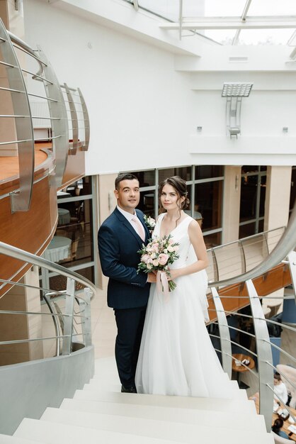 Full length portrait of the bride and groom