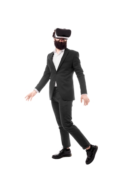 full length portrait of businessman in virtual reality glasses, isolated on white space