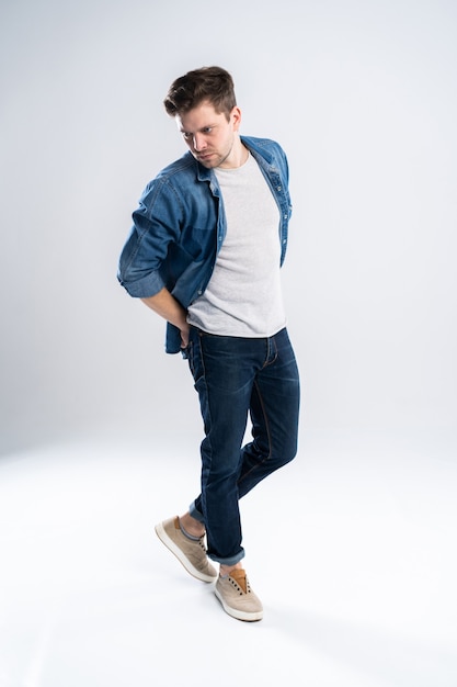 Full length portrait of a casual man standing.