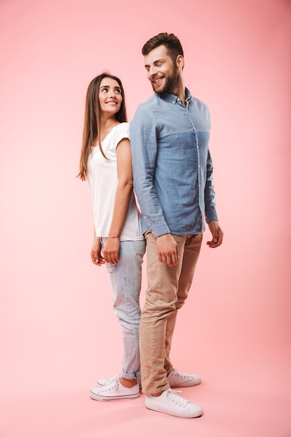 Full length portrait of a happy young couple