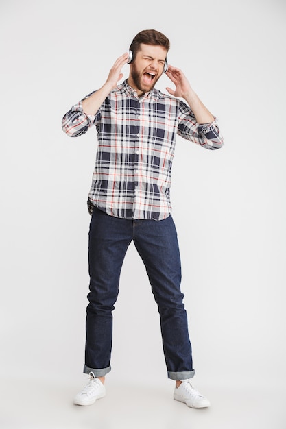 Full length portrait of a happy young man