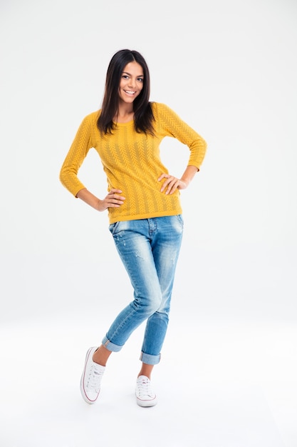 Full length portrait of a happy young woman