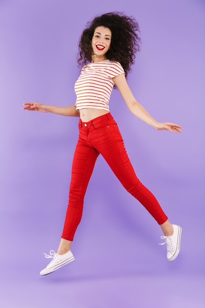 Full length portrait of a pretty young casual woman