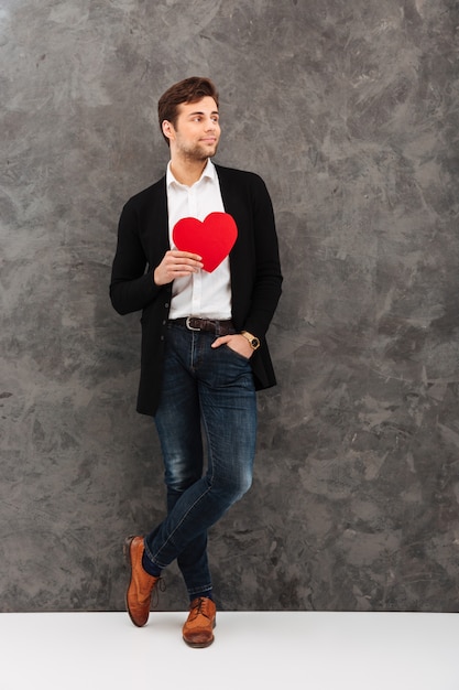 Full length portrait of a smcharming ling young man