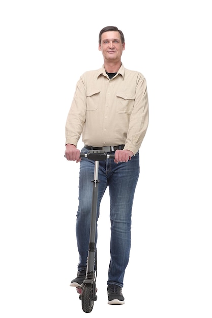 Photo full length portrait of an young man riding a scooter