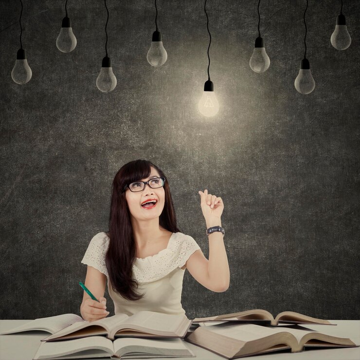 Photo 本を読んでいる若い女性の全長肖像画