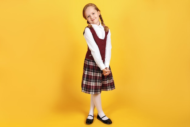 Full-length schoolgirl in uniform