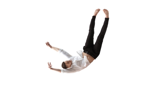 Photo full length studio shot of young man hovering in air