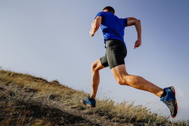 Photo full length of woman exercising against clear sky